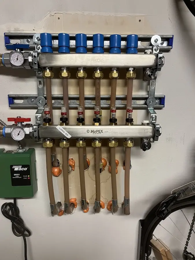 Plumber performing Water Heater Repair at a residential property in Vernon